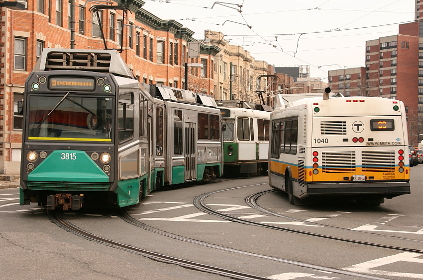 picture of a streetrunning green line light rail vehicle, credit to http://photos.nerail.org/s/?p=161692 for photo!